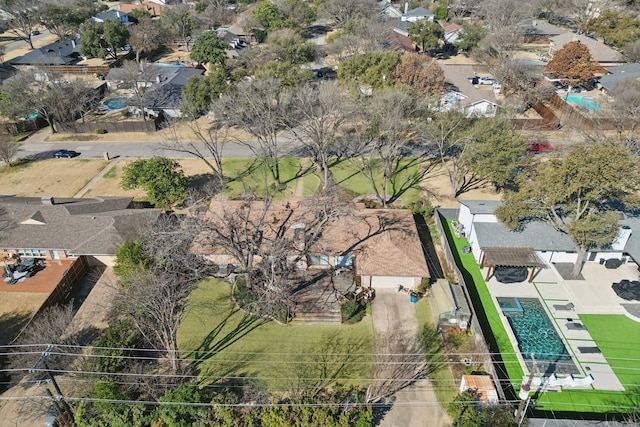 birds eye view of property with a residential view