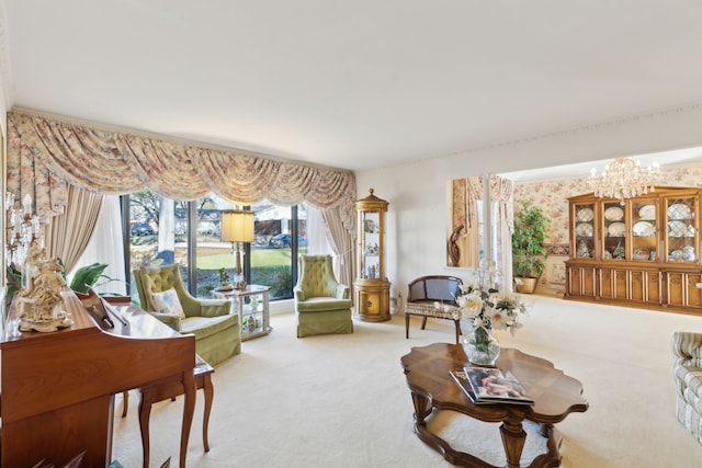 living area featuring wallpapered walls, an inviting chandelier, and carpet