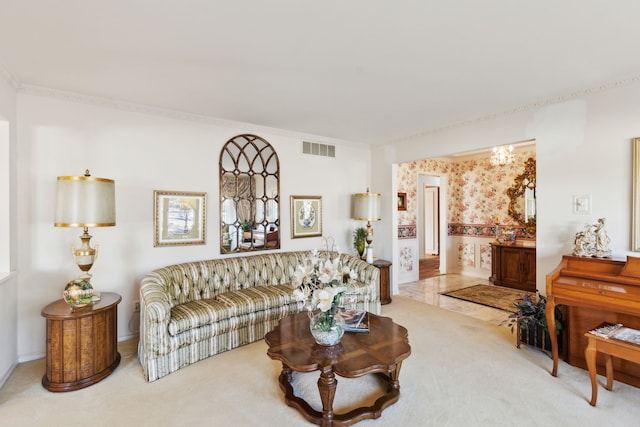 living room featuring wallpapered walls, carpet flooring, visible vents, and ornamental molding