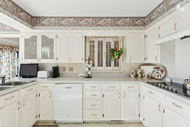 kitchen with white dishwasher, a sink, light countertops, white cabinets, and black electric cooktop