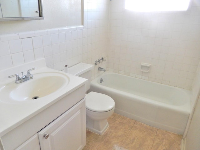 full bathroom featuring shower / bathing tub combination, toilet, tile walls, and vanity