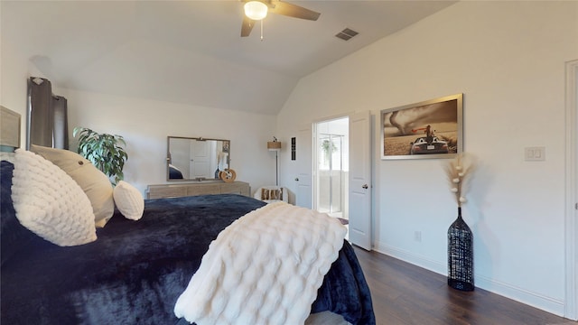 bedroom with visible vents, a ceiling fan, wood finished floors, baseboards, and vaulted ceiling