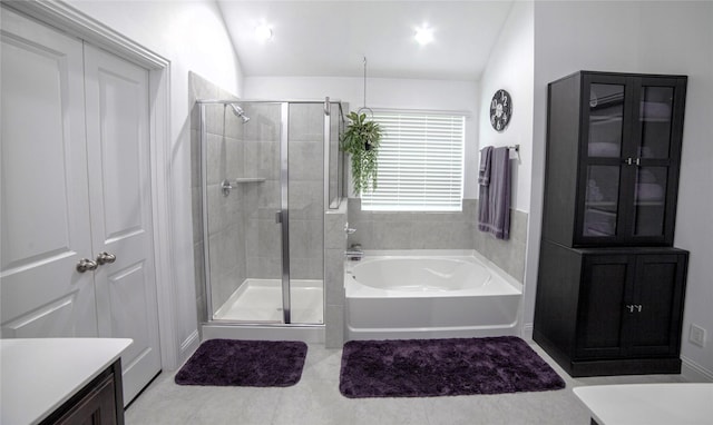 1525 Wagon Wheel Way, Krum, TX 76249 - bathroom with a garden tub, a shower stall, vanity, and vaulted ceiling