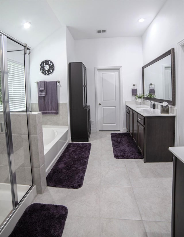 1525 Wagon Wheel Way, Krum, TX 76249 - full bathroom with vanity, a stall shower, a bath, tile patterned flooring, and vaulted ceiling