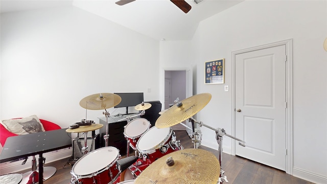 game room with baseboards, lofted ceiling, a ceiling fan, and wood finished floors