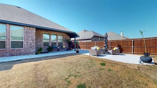 view of yard with an outdoor hangout area, a patio area, and fence private yard