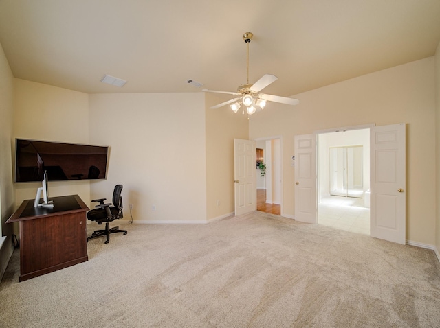 carpeted office featuring visible vents, baseboards, and a ceiling fan