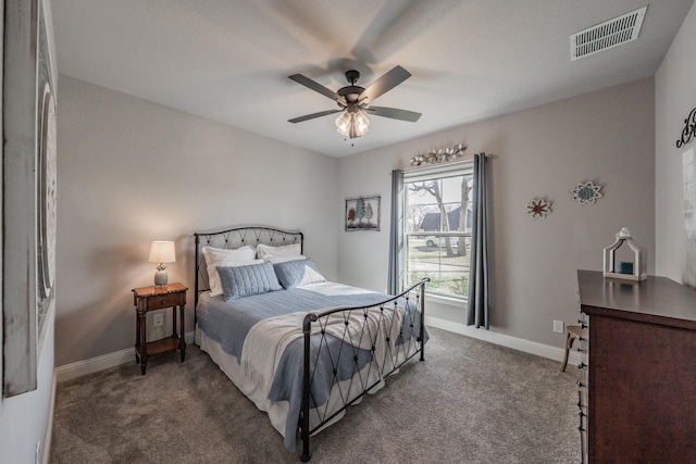 bedroom with visible vents, baseboards, and carpet