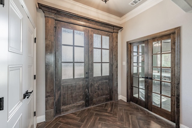 entryway featuring ornamental molding, french doors, visible vents, and baseboards