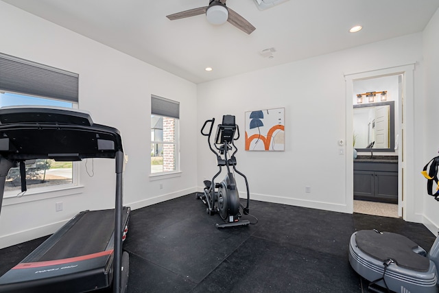 exercise area featuring recessed lighting, baseboards, and a ceiling fan