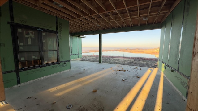 patio terrace at dusk with a water view