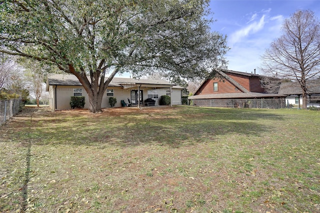 view of yard featuring fence