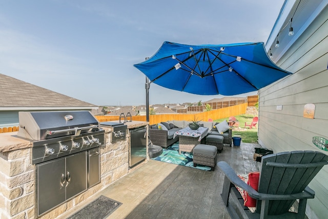 view of patio / terrace featuring outdoor lounge area, area for grilling, and fence