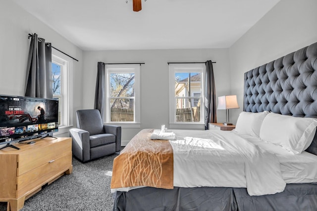 bedroom featuring carpet flooring and a ceiling fan