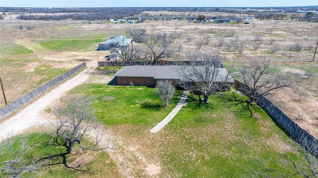 birds eye view of property with a rural view