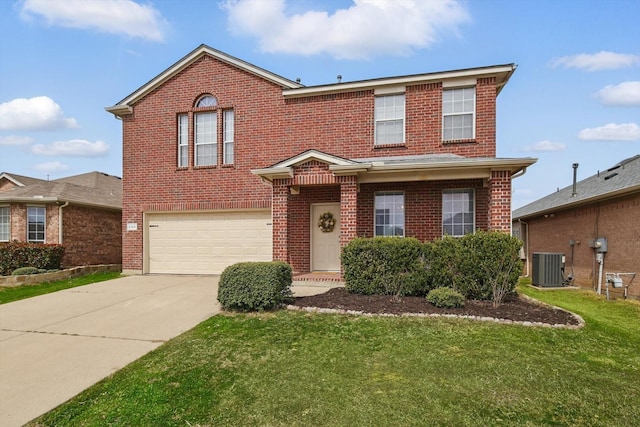 traditional-style home with concrete driveway, central AC unit, and brick siding