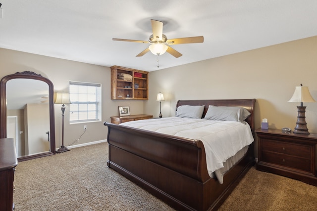 bedroom with baseboards, a ceiling fan, and carpet flooring