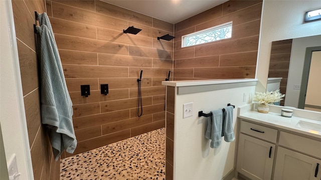 full bathroom with vanity and a walk in shower