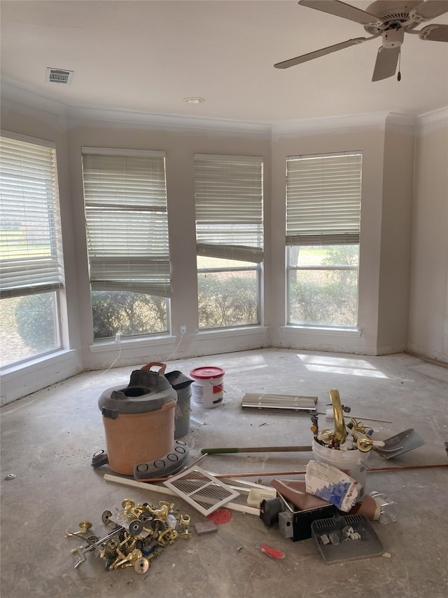 unfurnished room featuring visible vents and crown molding