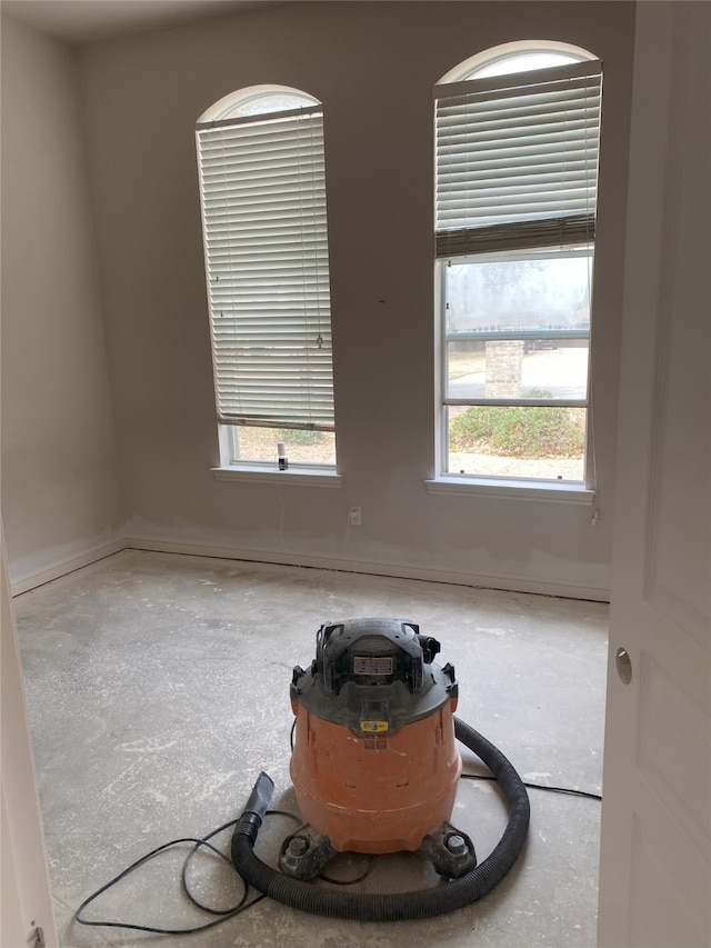 empty room with baseboards