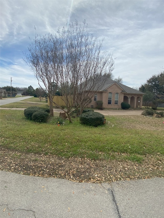 view of front of property with brick siding