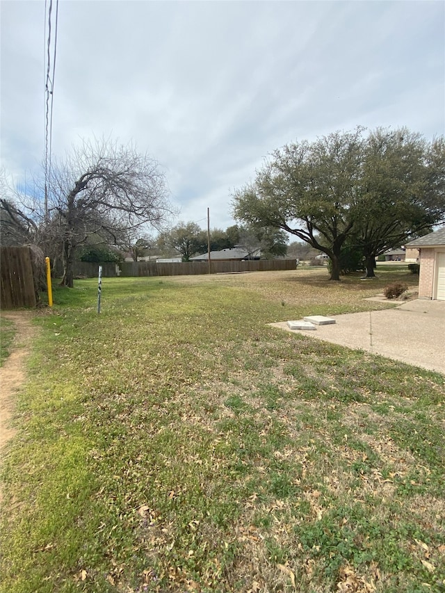 view of yard with fence