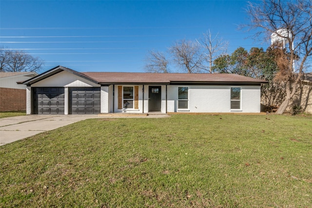 view of front facade featuring brick siding, a front yard, concrete driveway, and an attached garage