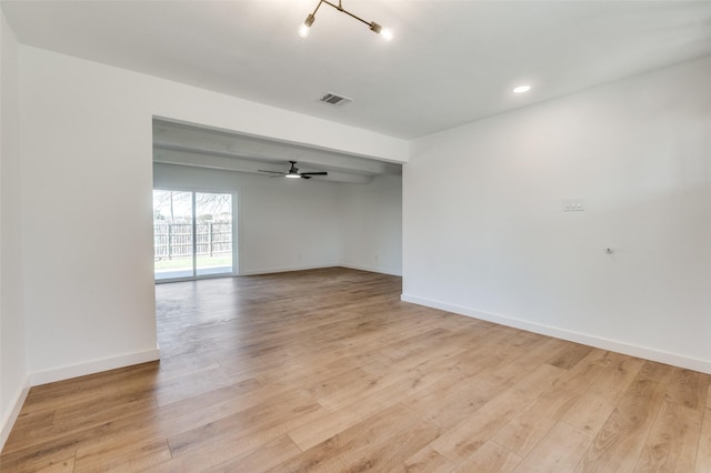 spare room featuring visible vents, baseboards, light wood finished floors, recessed lighting, and ceiling fan