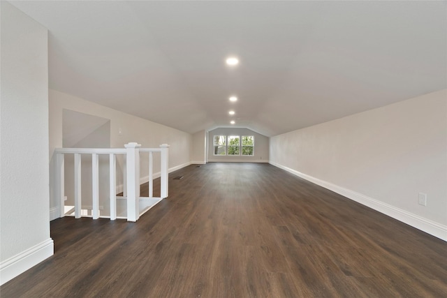 bonus room featuring vaulted ceiling, recessed lighting, baseboards, and dark wood-style flooring