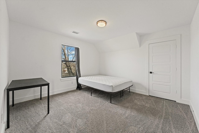 bedroom with baseboards, visible vents, and carpet floors