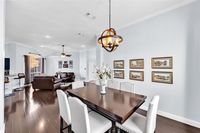 dining area featuring dark wood-style floors, visible vents, and ornamental molding