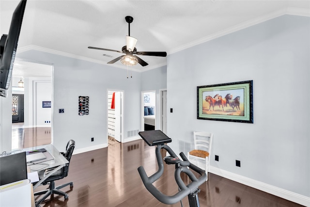 home office with visible vents, baseboards, wood finished floors, and crown molding