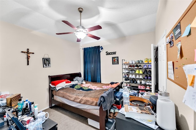 bedroom featuring carpet flooring, a ceiling fan, and baseboards