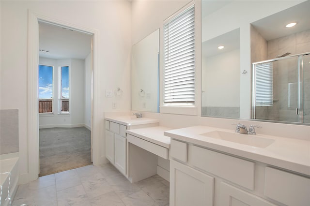 full bathroom featuring recessed lighting, marble finish floor, a stall shower, and vanity