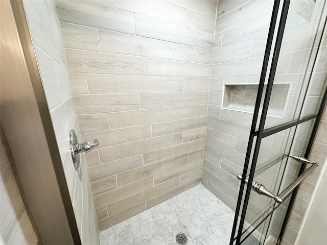 bathroom with a stall shower