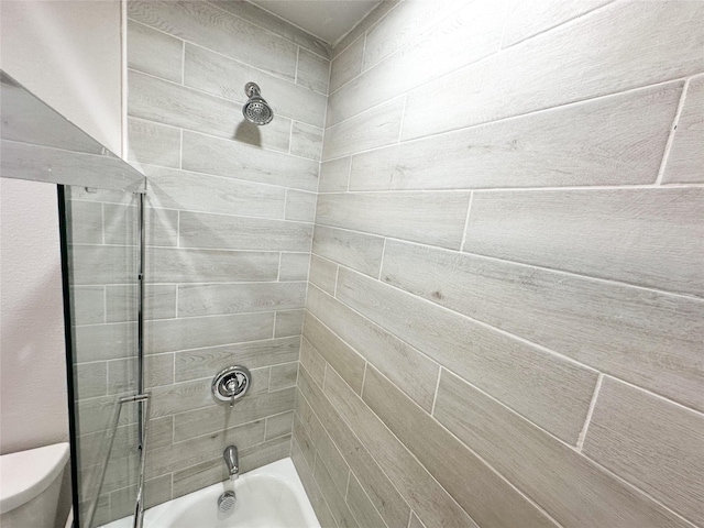 full bath with toilet and bathtub / shower combination