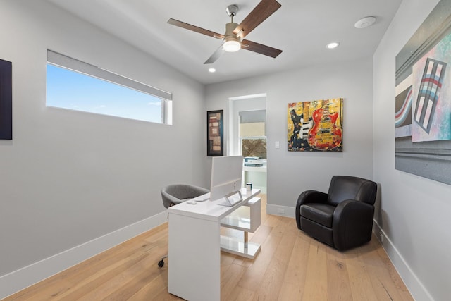 office space with recessed lighting, baseboards, light wood-style floors, and ceiling fan