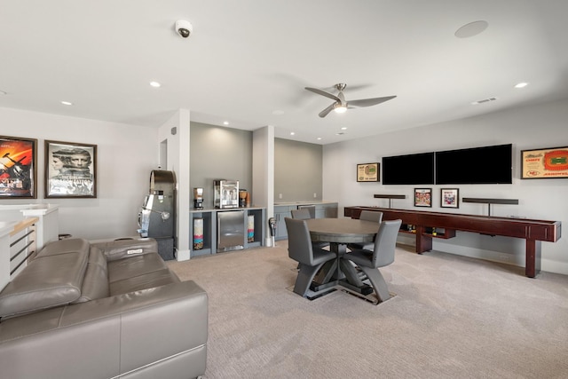 living area featuring visible vents, recessed lighting, baseboards, light colored carpet, and ceiling fan