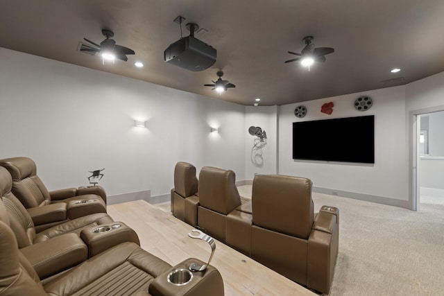 carpeted cinema with visible vents, recessed lighting, baseboards, and ceiling fan