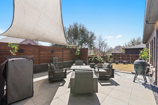 view of patio with an outdoor hangout area and a fenced backyard