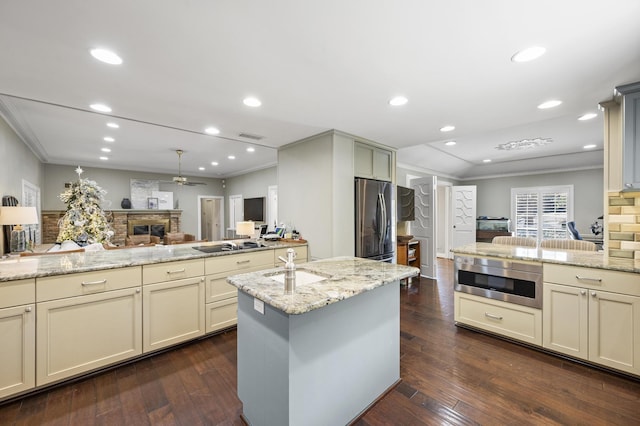 kitchen featuring crown molding, recessed lighting, dark wood-style floors, and freestanding refrigerator