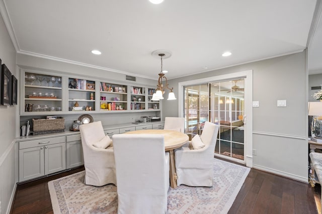 dining area with dark wood finished floors, visible vents, recessed lighting, and ornamental molding