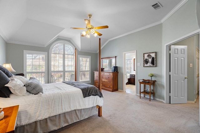 bedroom with visible vents, crown molding, baseboards, light colored carpet, and vaulted ceiling