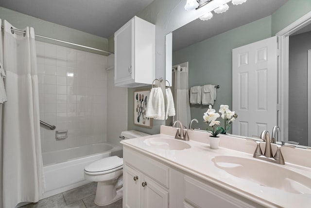 bathroom with tile patterned flooring, toilet, shower / bath combo with shower curtain, and a sink