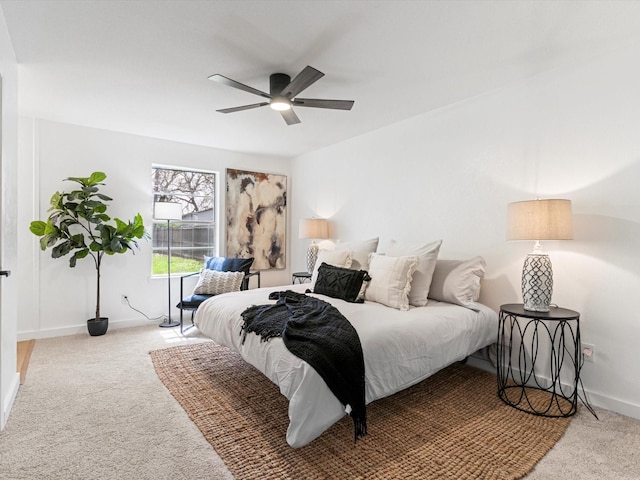 bedroom with carpet flooring, baseboards, and ceiling fan