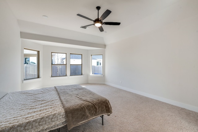 bedroom with baseboards, carpet, and ceiling fan