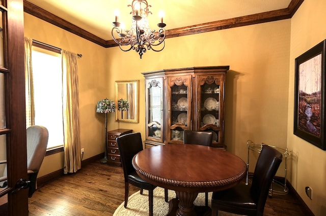 dining space with dark wood finished floors, an inviting chandelier, plenty of natural light, and crown molding