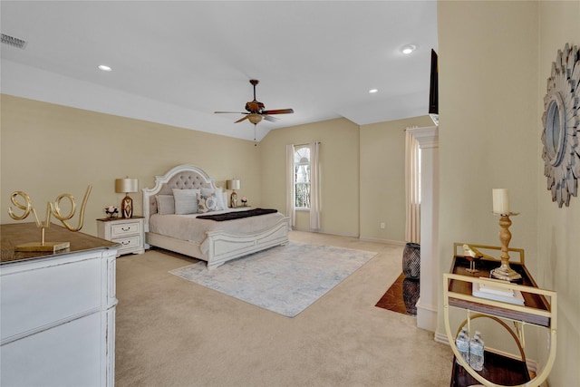 bedroom with ceiling fan, recessed lighting, visible vents, and light carpet