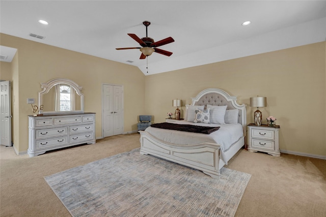 bedroom with visible vents, carpet flooring, baseboards, and lofted ceiling