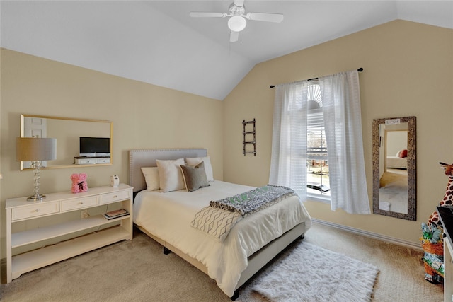 bedroom with light carpet, multiple windows, lofted ceiling, and ceiling fan